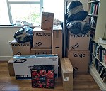 I6 boxes and bags and a bike.