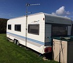 27ft caravan hobby Prestige will need to be put on lorry as wheels not very good