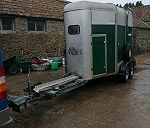 Horse trailer with carriage extension