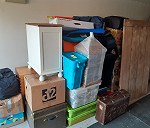 boxes and personal belongings. No beds etc. just one large wooden board