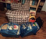 6 toreb z książkami i ubraniami i rower