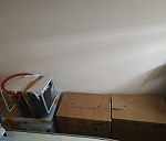 Boxes 21–30, Impresora en caja x 1, Olla express en caja x 1, Bicycle x 1, Bolsas azules de Ikea  x 
